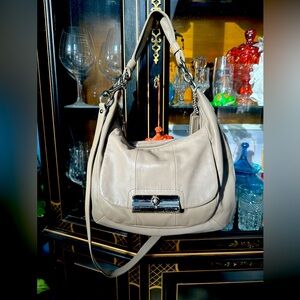 Coach Kristin leather hobo bag in a grayish taupe